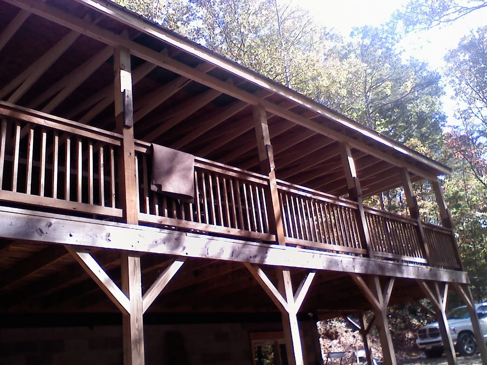 Timber framing under a new elevated porch and deck — Roof Leak Repair in Millport by Roofing Brothers
